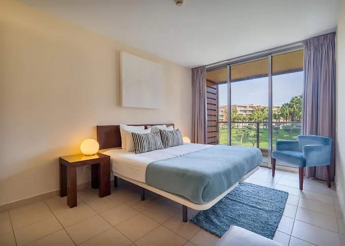 Апартаменти Stylish 2bdr Flat With Pool In Salgados By Lovelystay